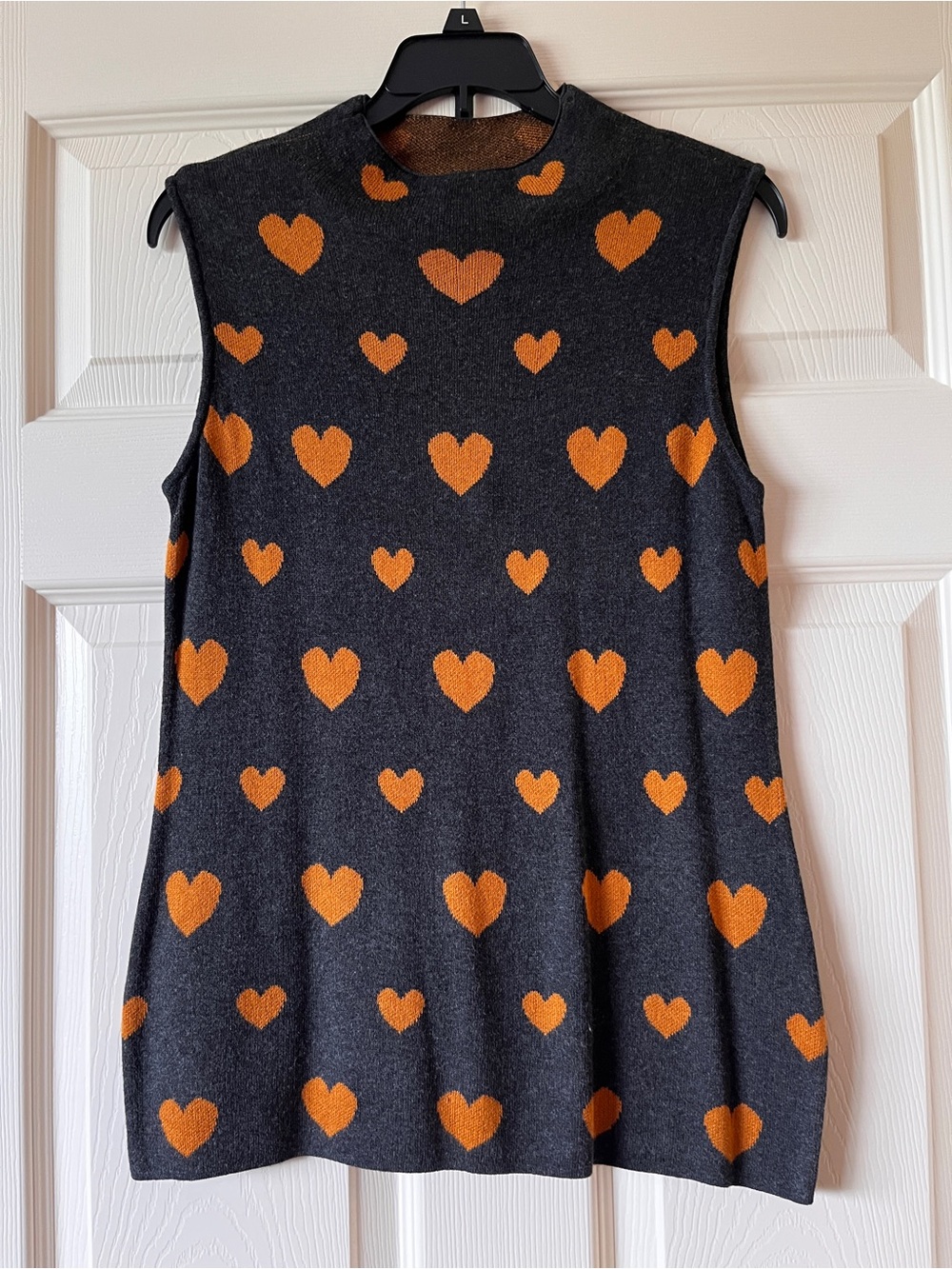 Elle Black Knit Top with Orange Dot Motif